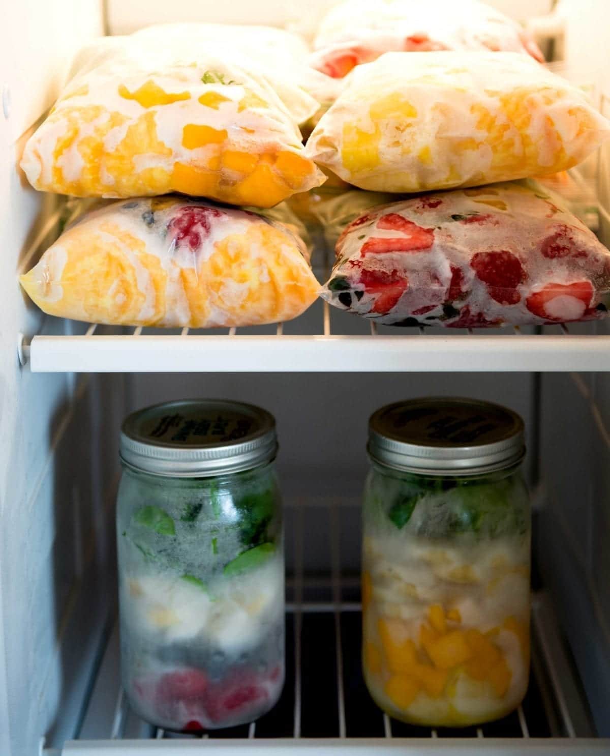 Make Ahead Smoothies in freezer with bags stacked nicely