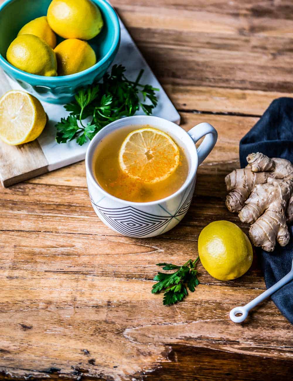 this mug of morning tonic included in our best drinks for weight loss list includes lemon, ginger, parsley, and cayenne.