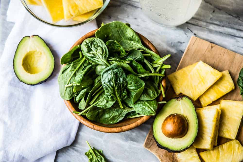 spinach, avocado, and pineapple are some of the best foods for clear skin