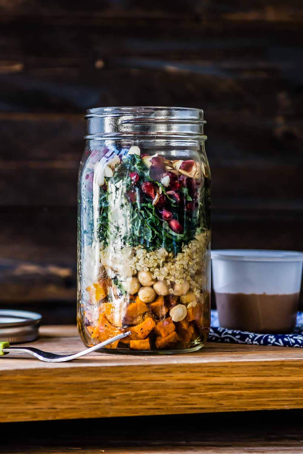 Vegan salad with autumn ingredients— sweet potatoes, garbanzo beans, kale