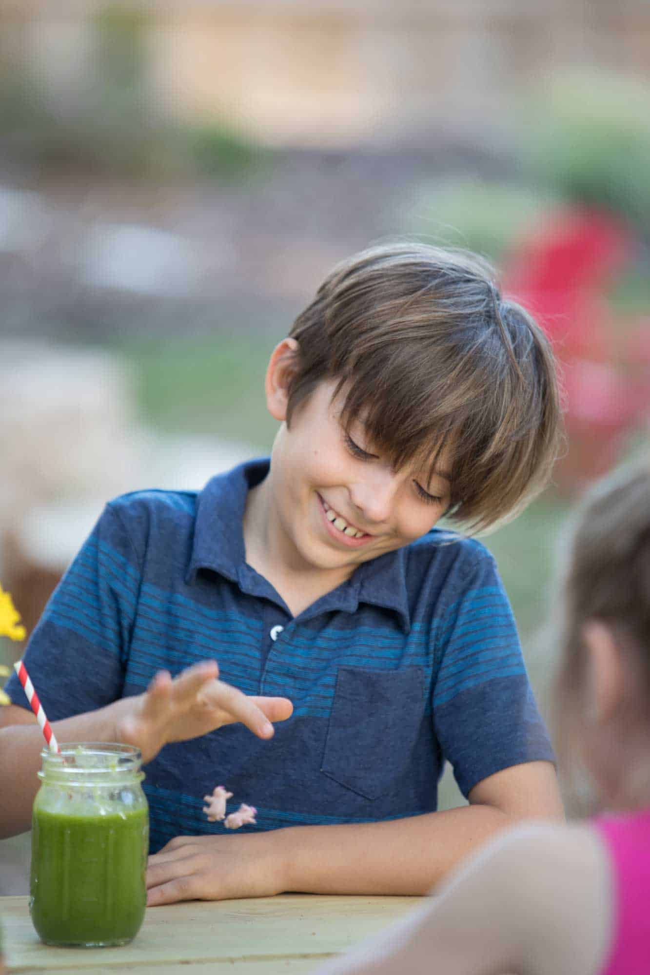 Hansard family backyard game time with green smoothies