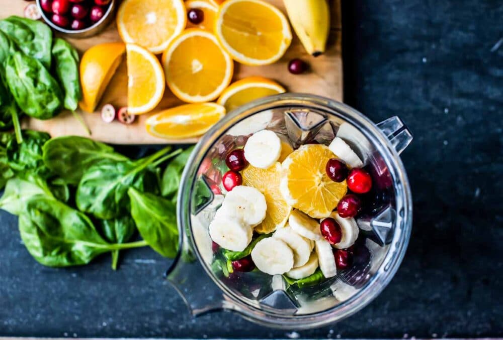 Fresh oranges, banana and spinach in this holiday smoothie recipe