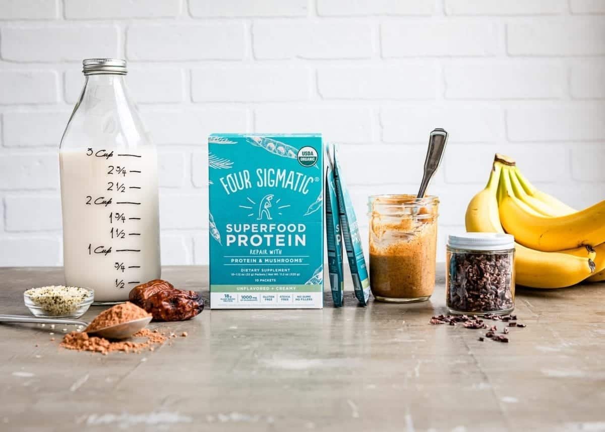 Ingredients used in a Chocolate Banana Protein Shake include plant-based items