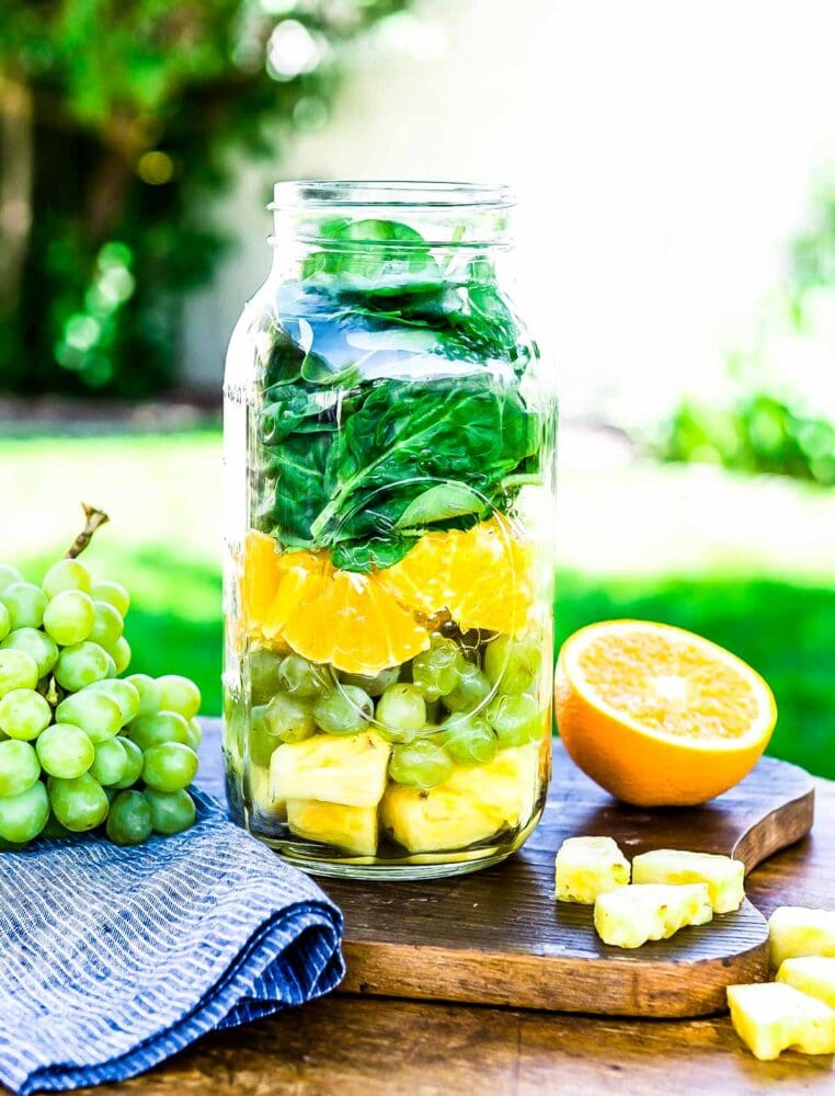 Smoothie prep for a green grape smoothie in a mason jar