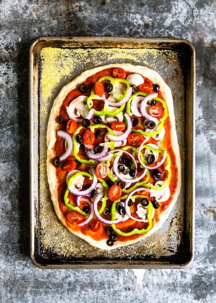 homemade pizza on a baking sheet