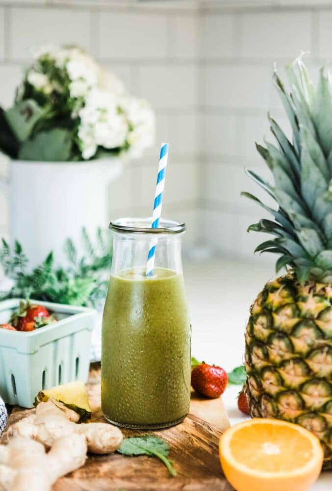 paper straws are eco-friendly additions to serving a pineapple ginger smoothie