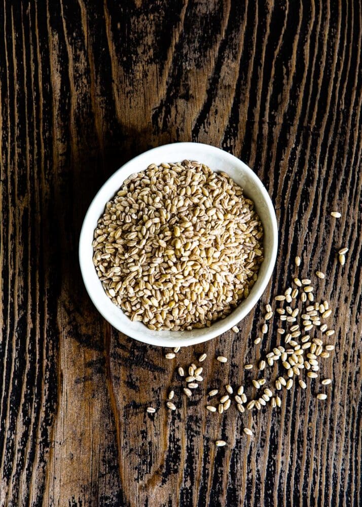 bowl of uncooked pearl barley.