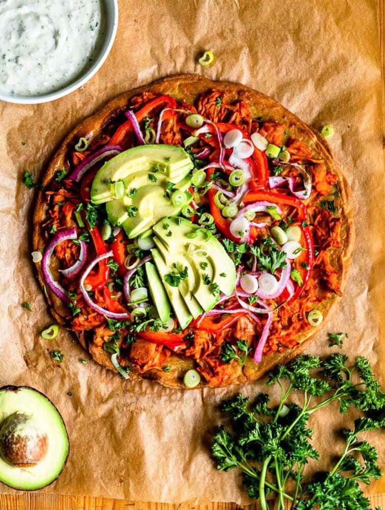 Homemade gluten free pizza crust with vegan toppings
