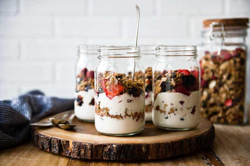 3 Vegan Yogurt Parfaits in mason jars