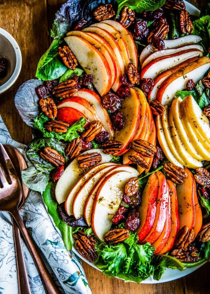 an autumn salad loaded with fall fresh ingredients