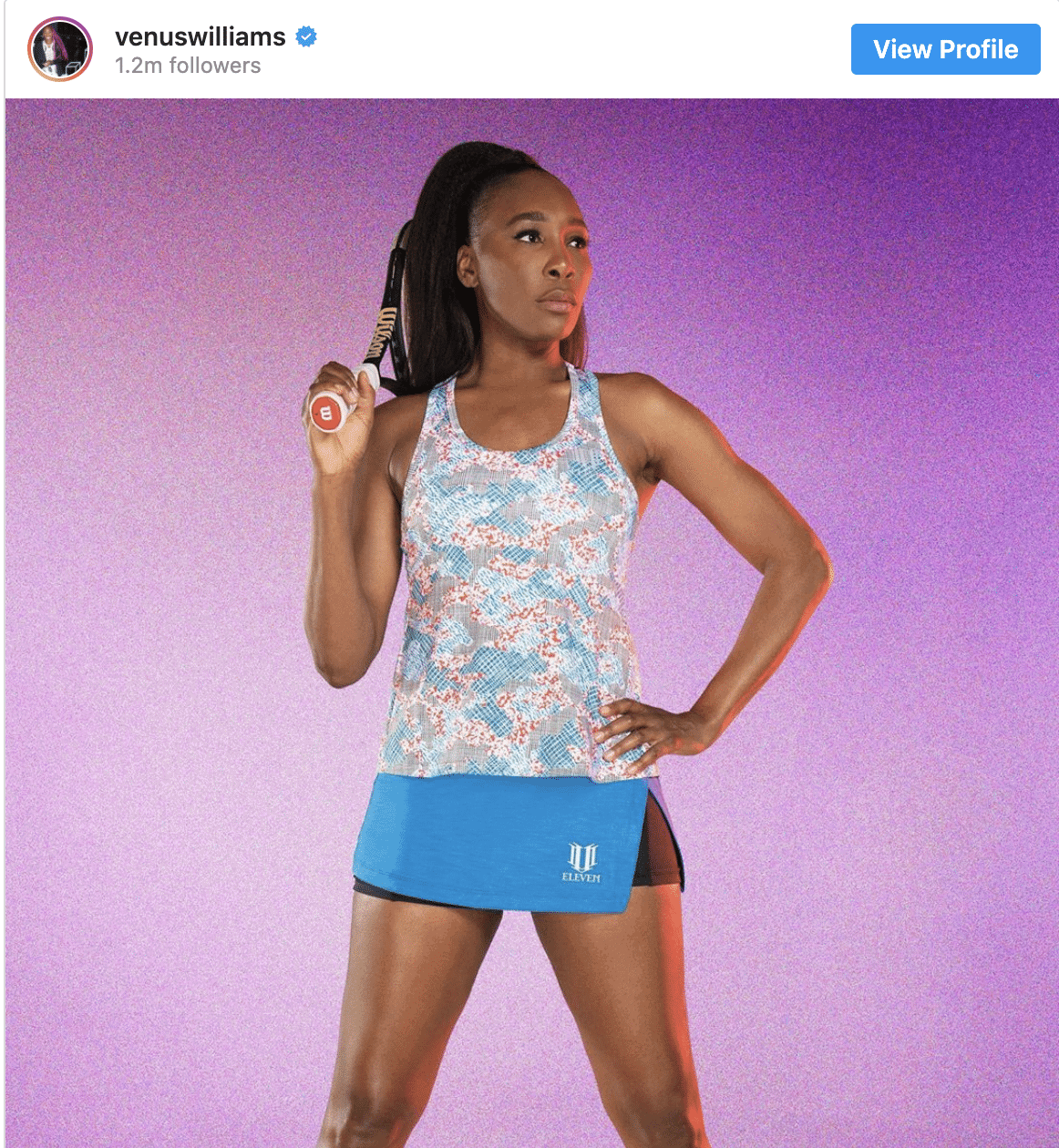 Tennis pro Venus Williams holding a tennis racket standing in front of a purple background.