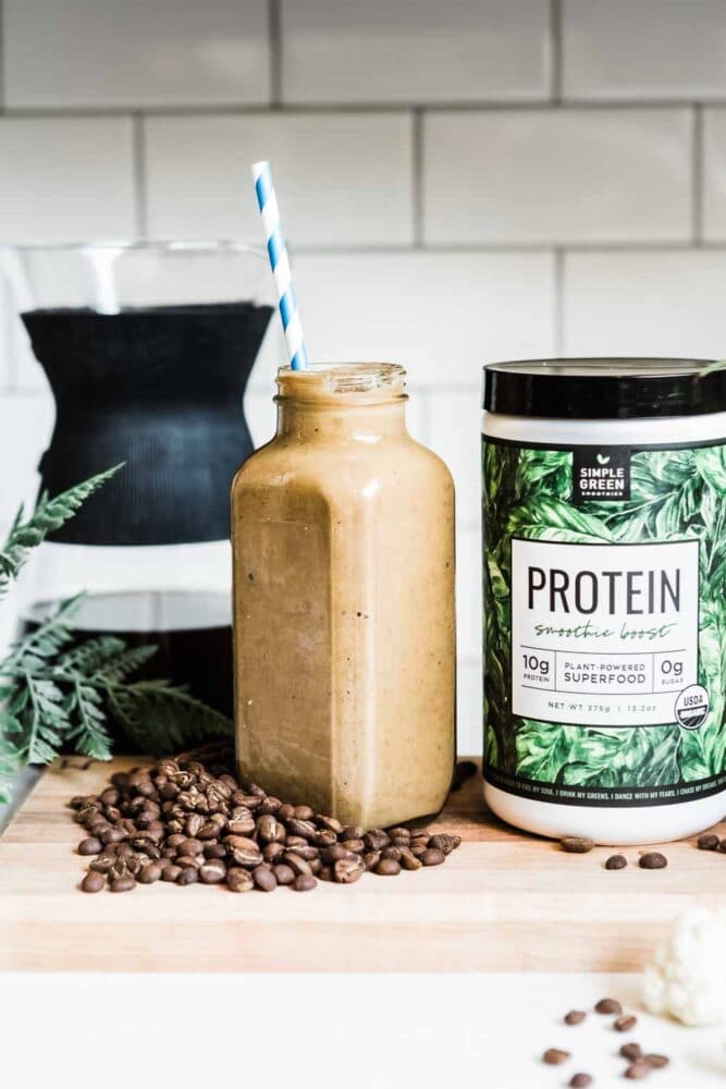 Adding protein powder to a coffee smoothie to make it more filling