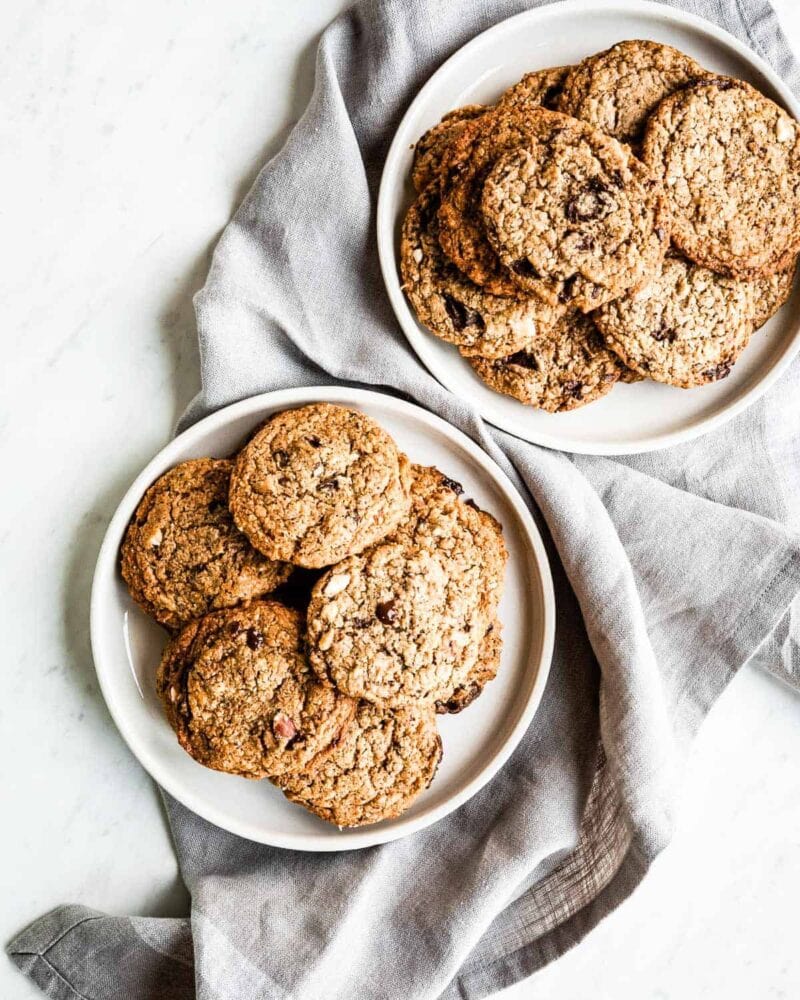 2 plates of vegan chocolate chip cookies.