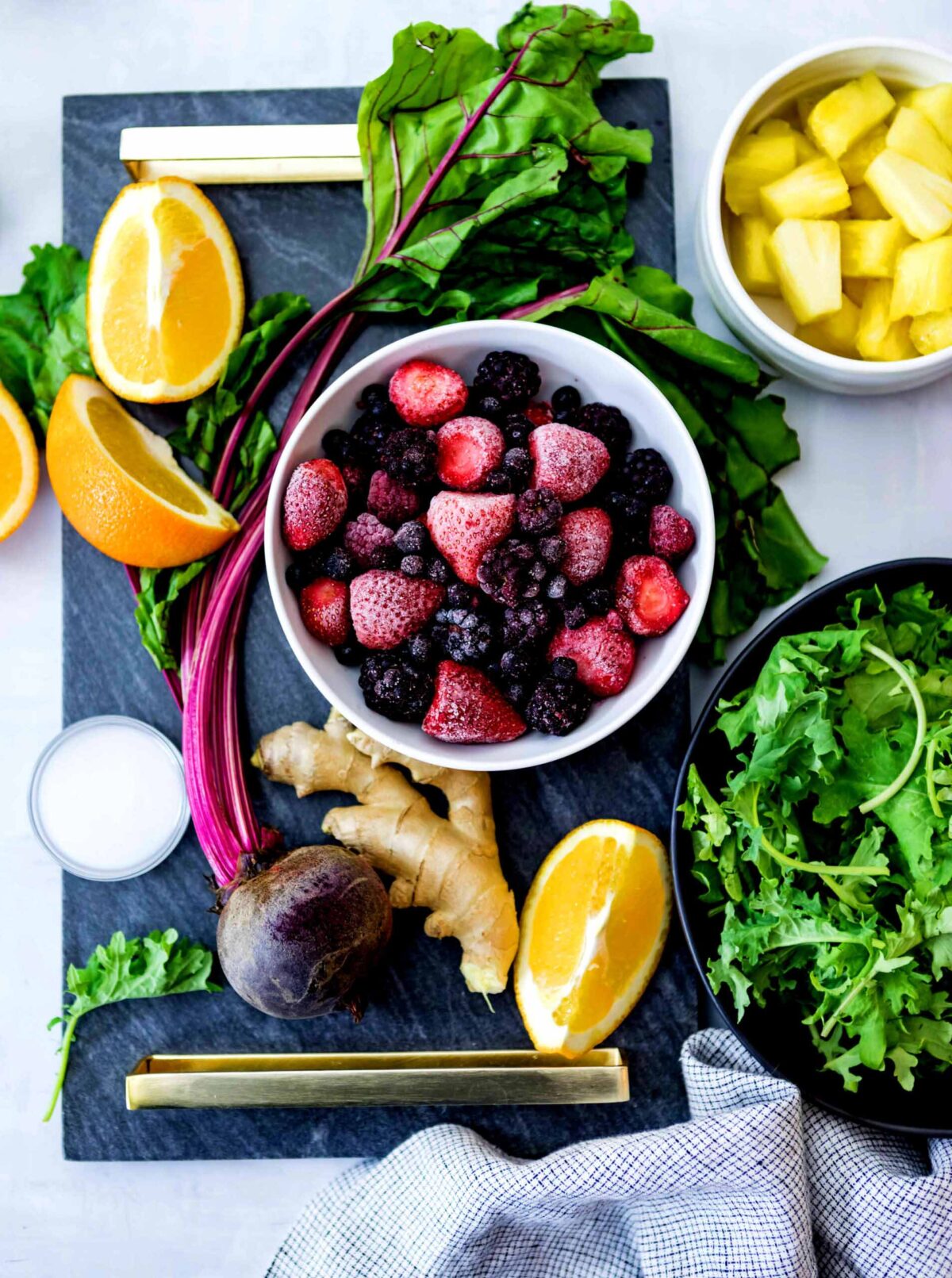Ingredients to make anti-inflammatory smoothie recipe on table ready to blend