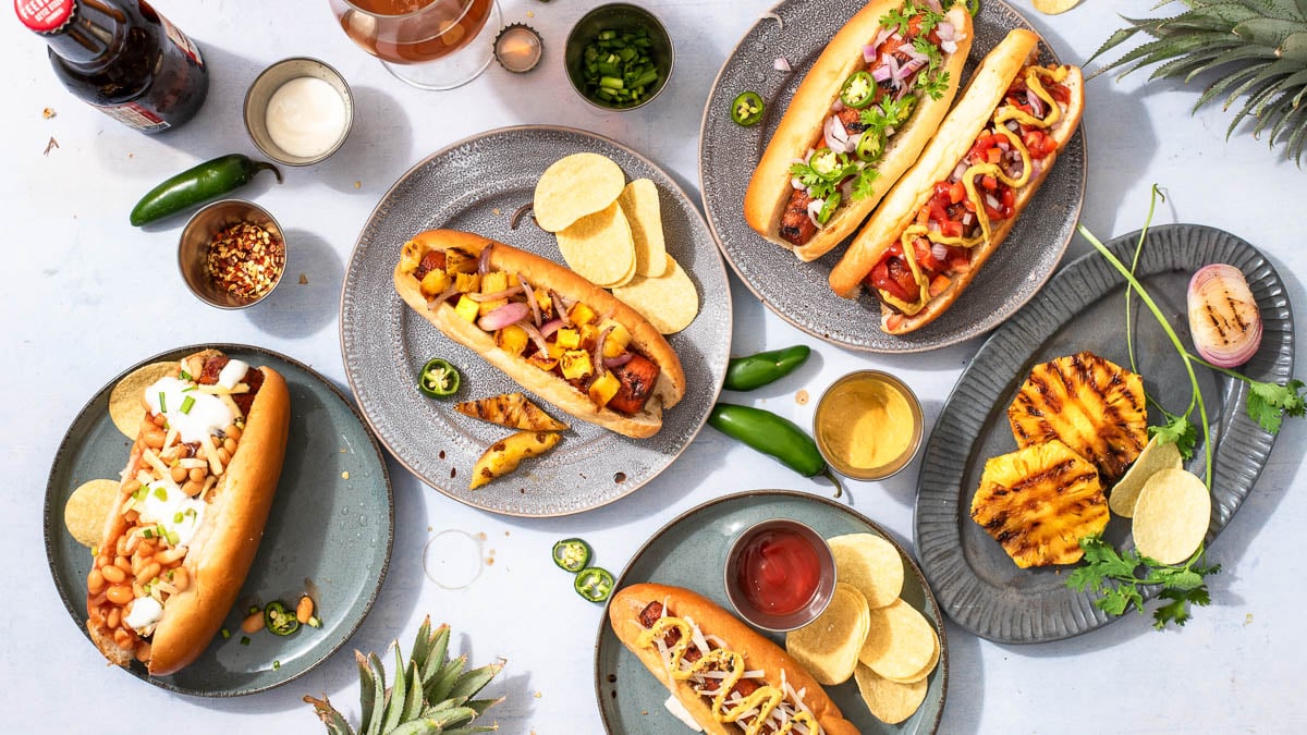 Carrot dogs loaded up with various toppings and ready to enjoy