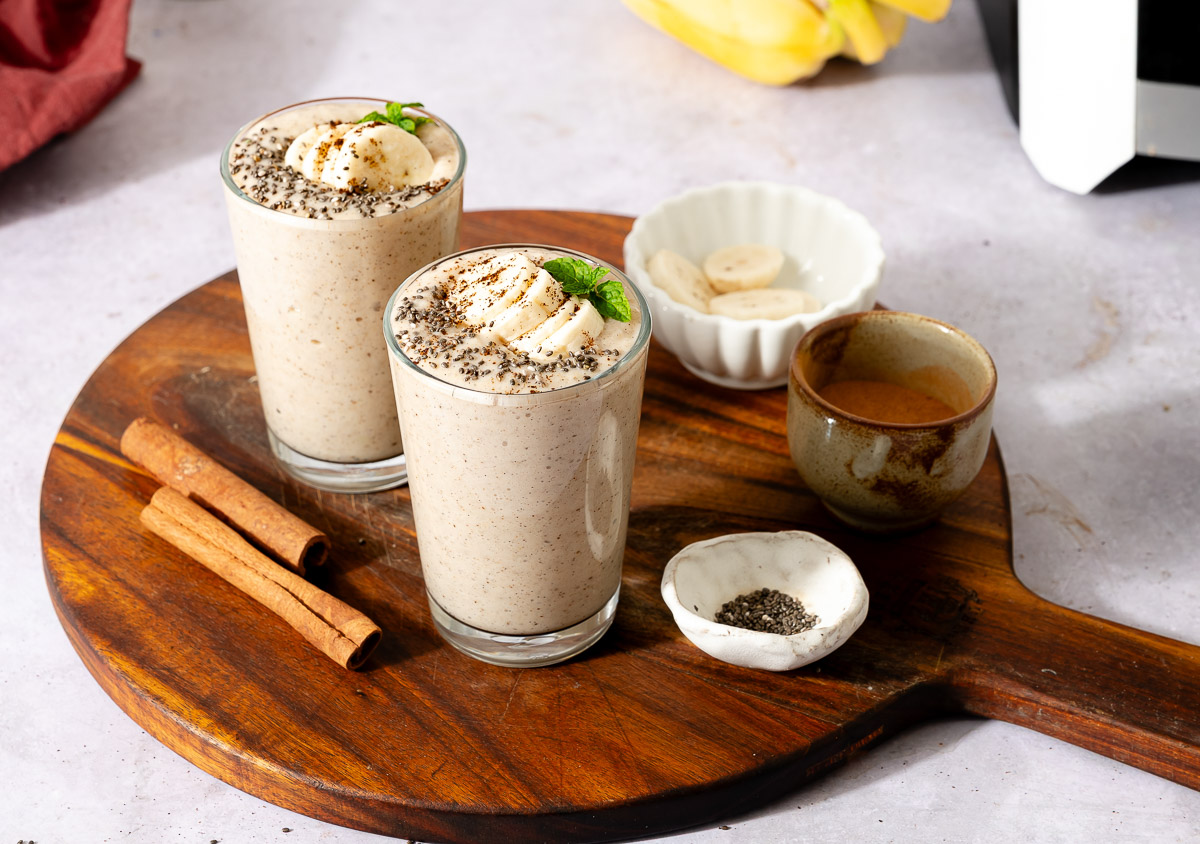 Two servings of banana protein shake on a serving tray