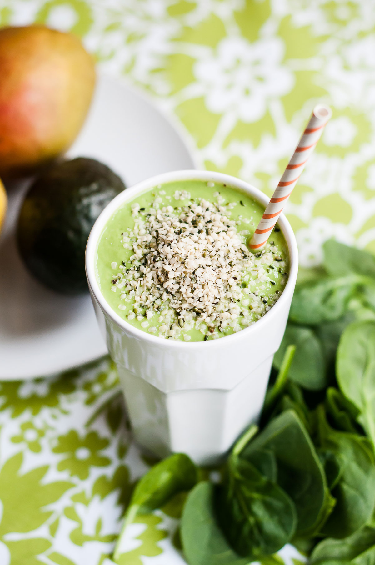 a glass full of brain fuel smoothie recipe, topped with hemp hearts.