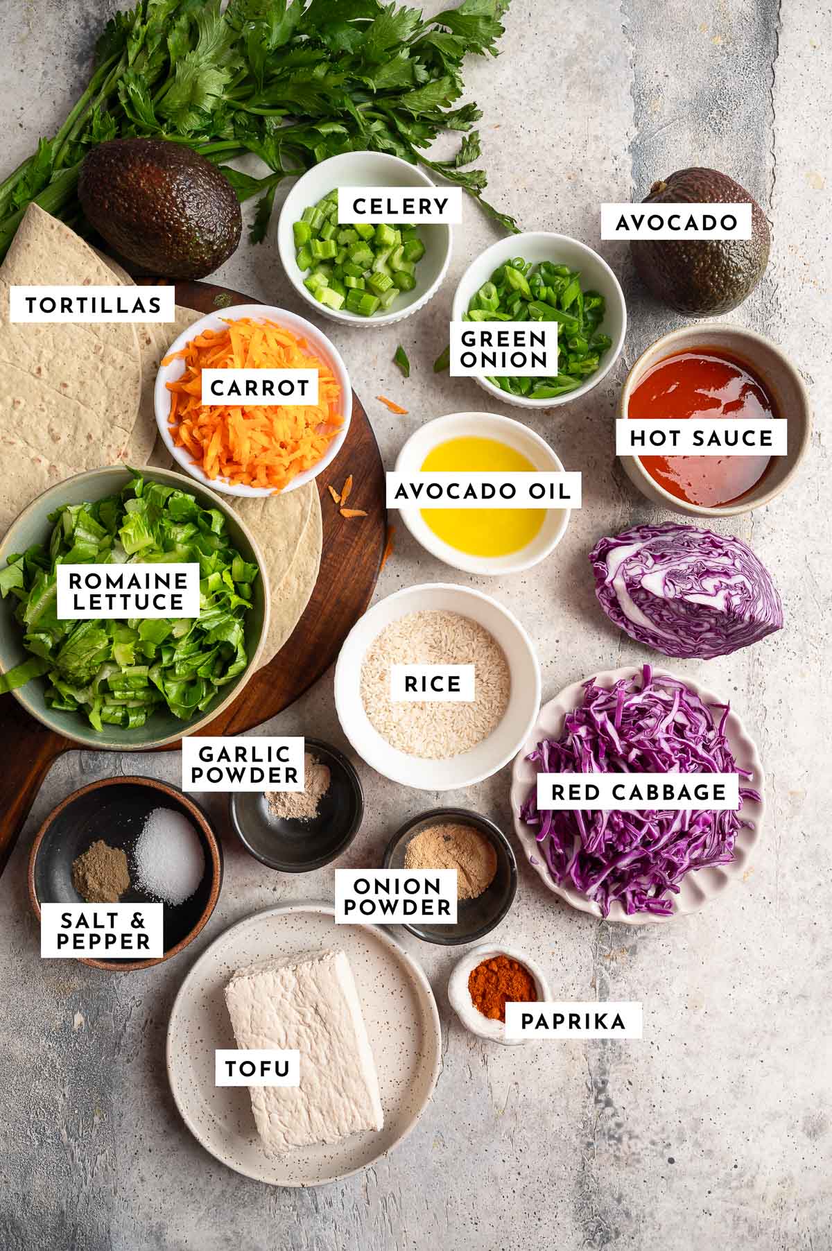 Ingredients for buffalo shredded tofu wraps laid on the table.