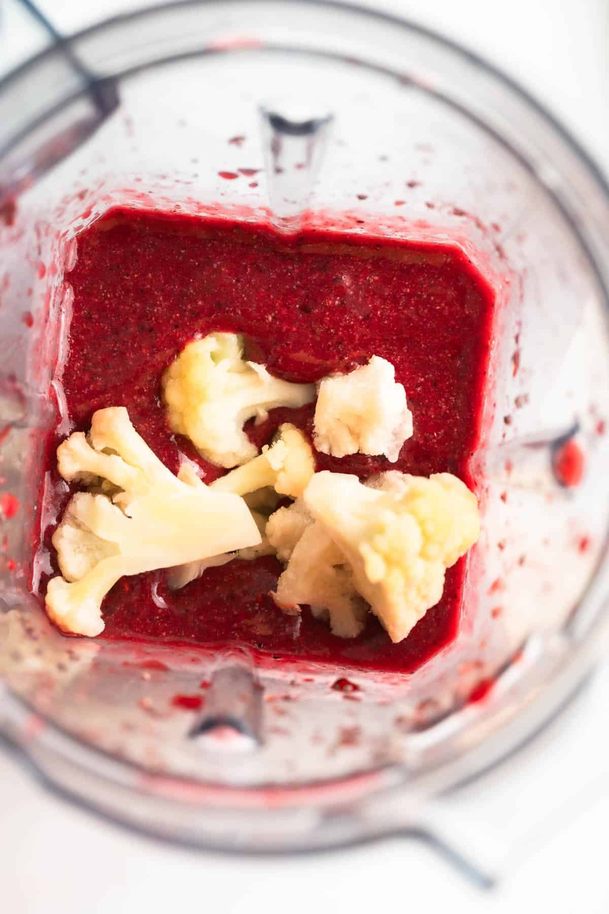 Fruit smoothie with cauliflower florets into the blender