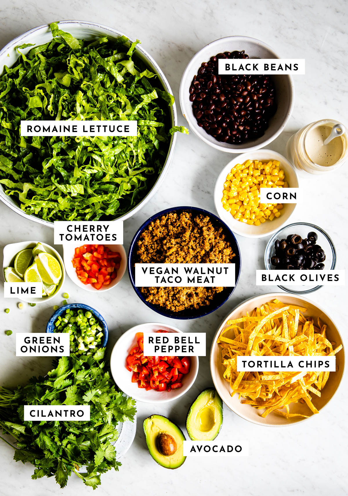 Fresh ingredients laid out, ready to prepare a flavorful healthy taco salad.