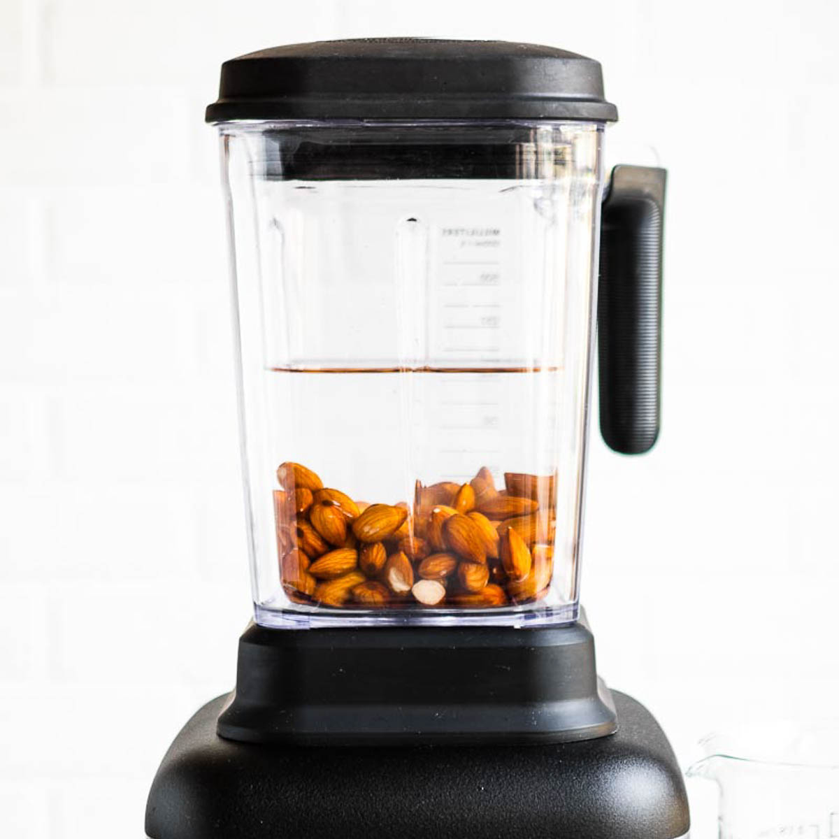 Blender with Almonds and water inside