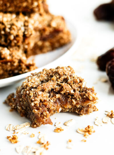 Chewy date bars with a bite taken out