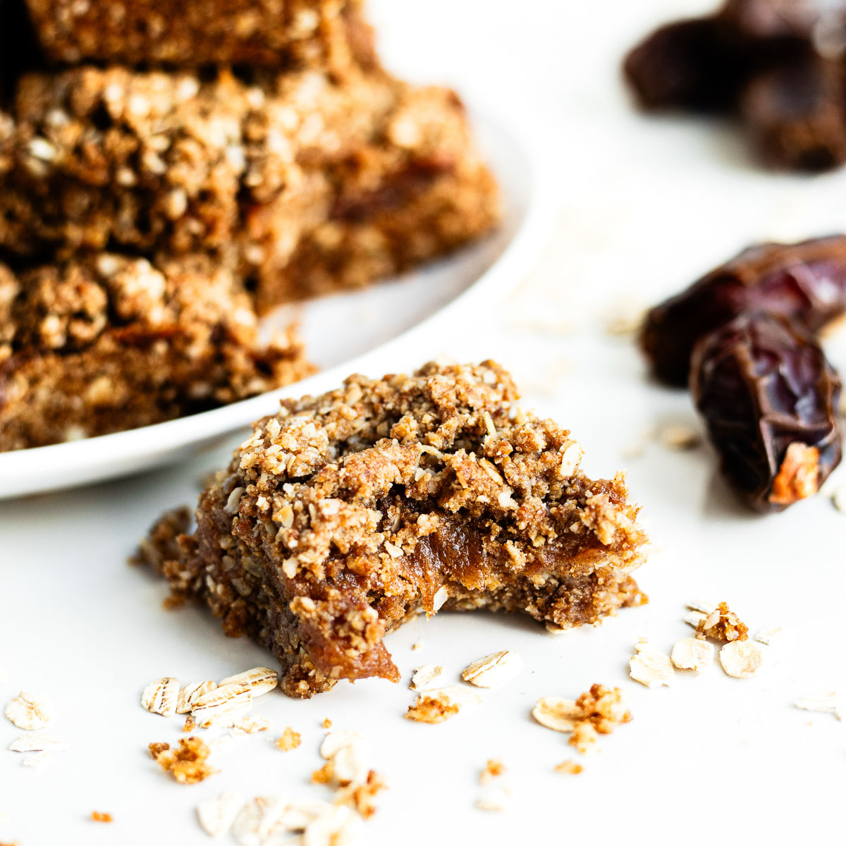 Chewy date bars with a bite taken out