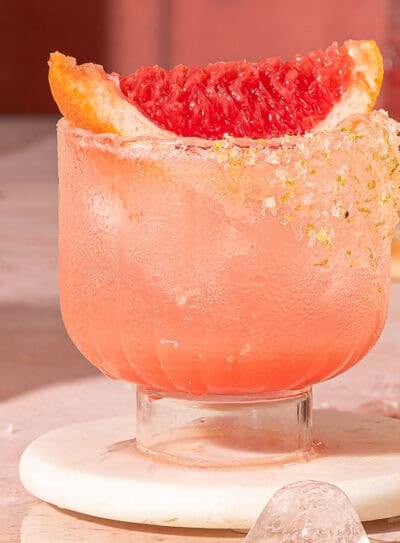 Freshly made paloma mocktail with sparkling water