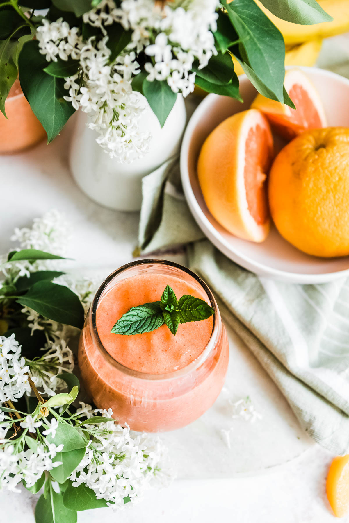 A glass of pink grapefruit smoothie