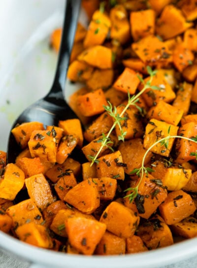 Roasted butternut squash cubes in a bowl