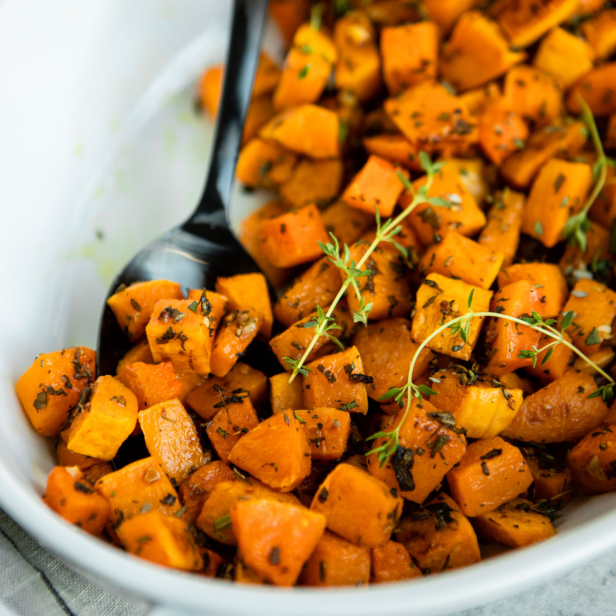 Roasted butternut squash cubes in a bowl