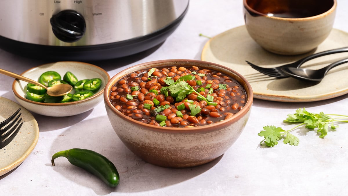 Bowl of slow cooker baked beans on the counter