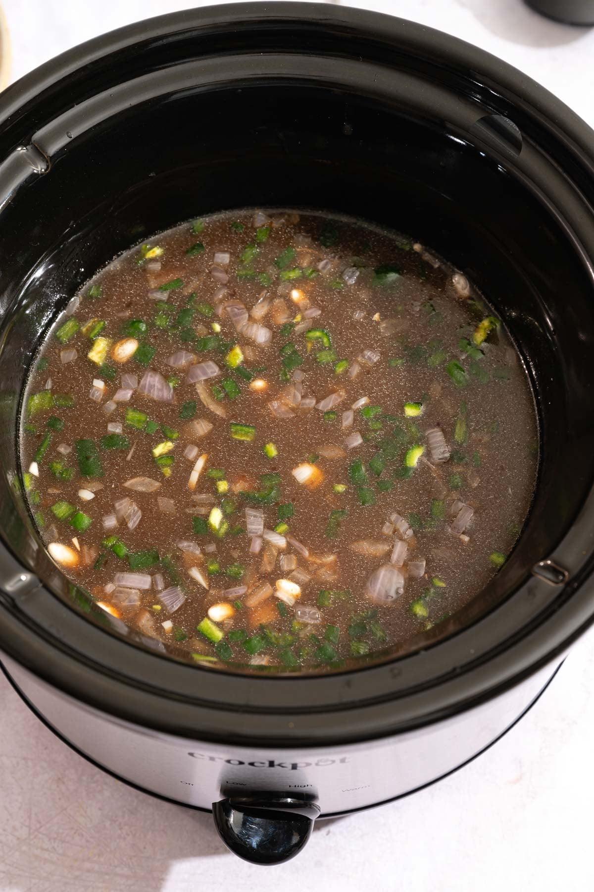 Vegetable stock added to the slow cooker