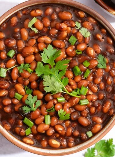 Bowl of slow cooker baked beans ready to enjoy