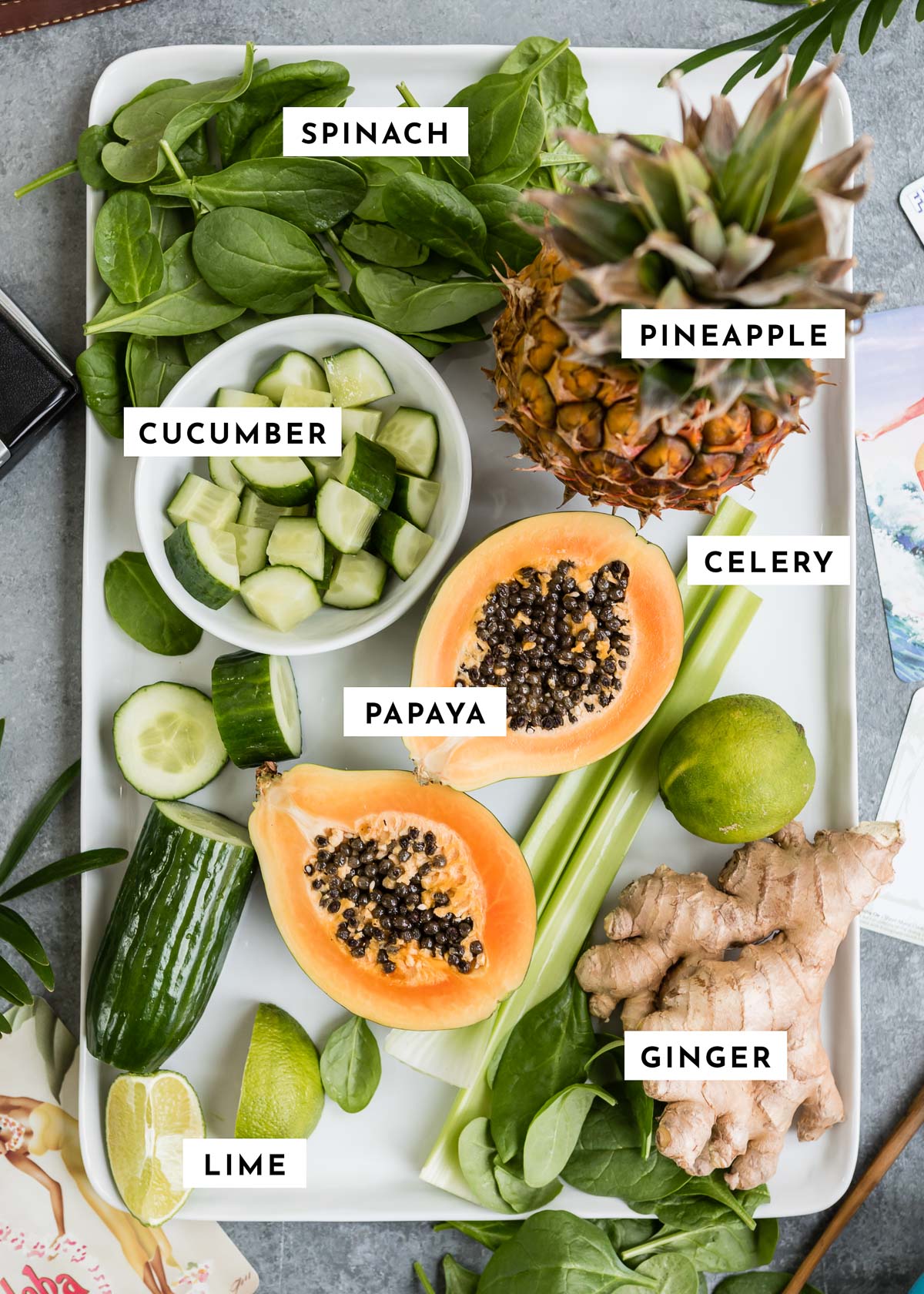 Labeled ingredients: Spinach, cucumber, pineapple, celery, papaya, ginger, and lime