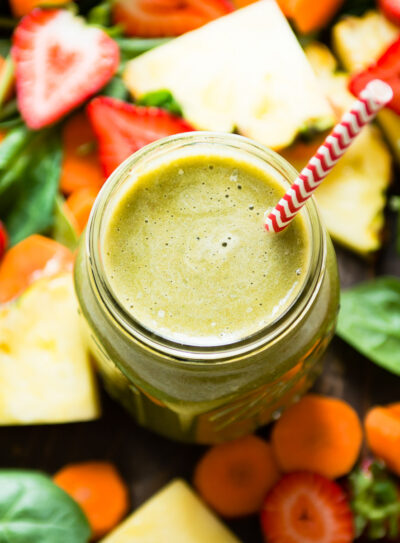 A glass of creamy strawberry carrot smoothie