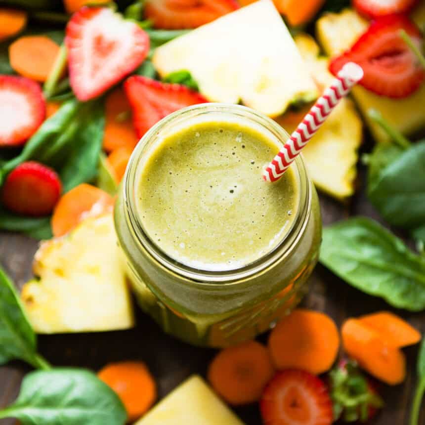 A glass of creamy strawberry carrot smoothie