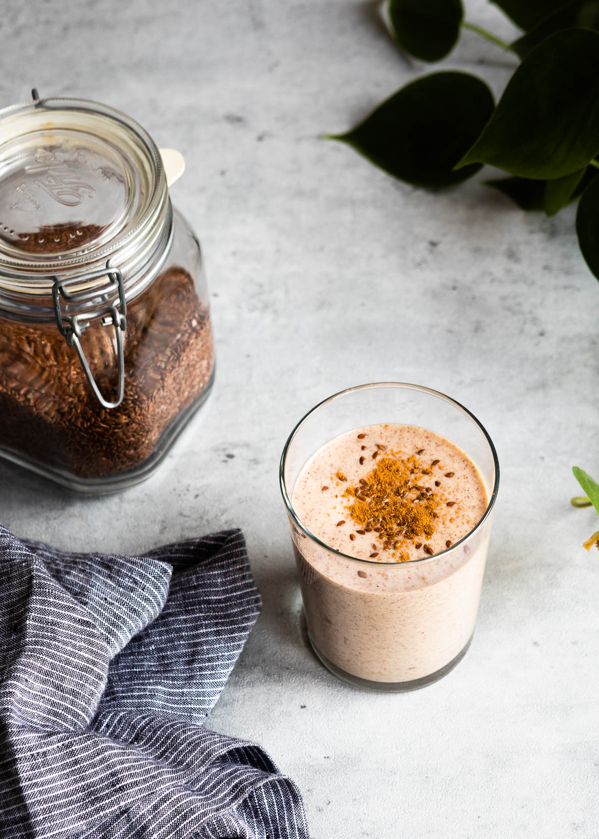 Creamy flaxseed smoothie with flaxseeds on top