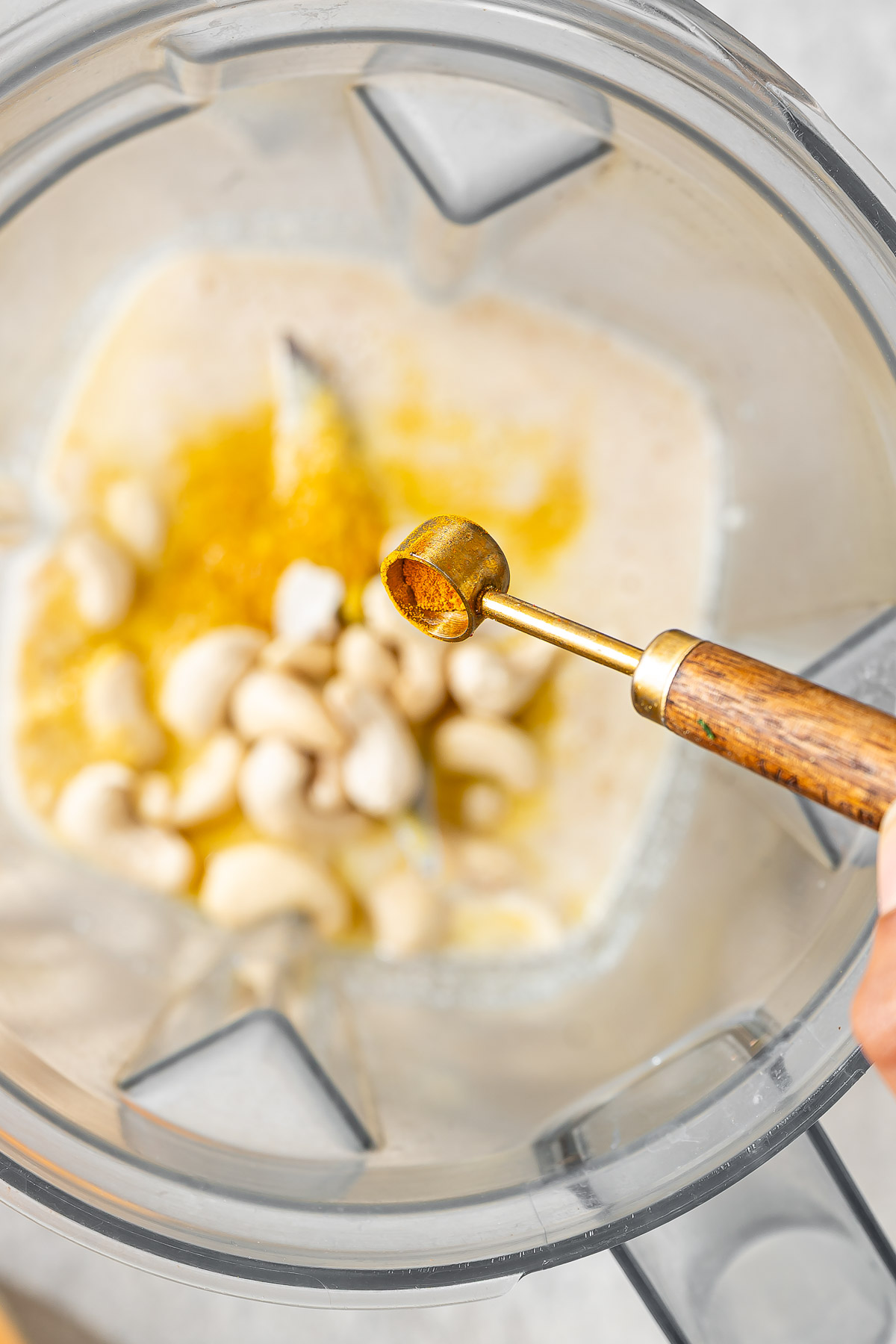 A teaspoon of turmeric in a butter mixture
