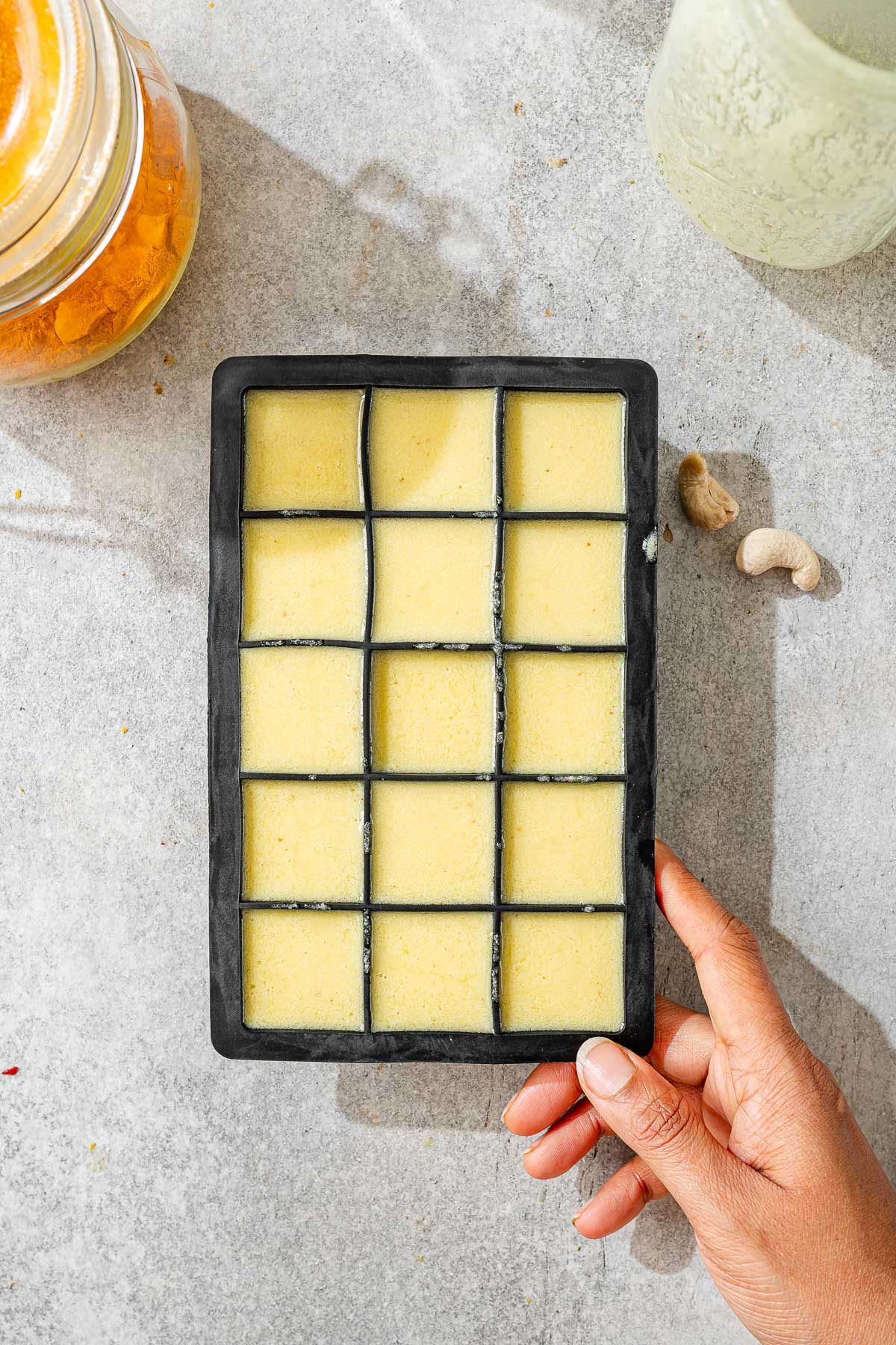 Vegan butter mixture in a ice cube mold