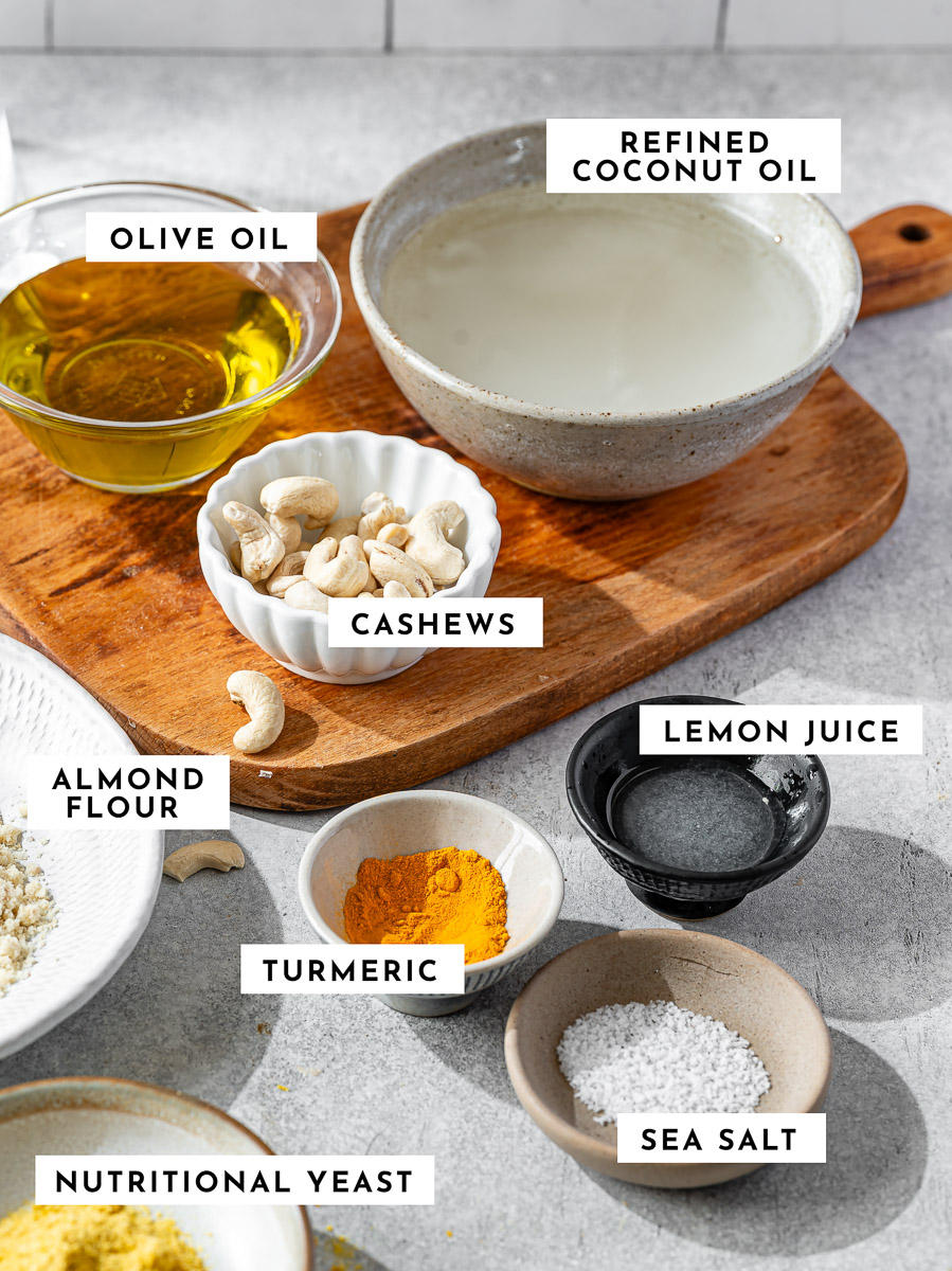 Ingredients for vegan butter on the counter and a wooden cutting board