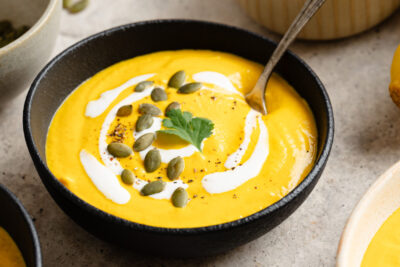 Beautiful vegan carrot ginger soup in a bowl