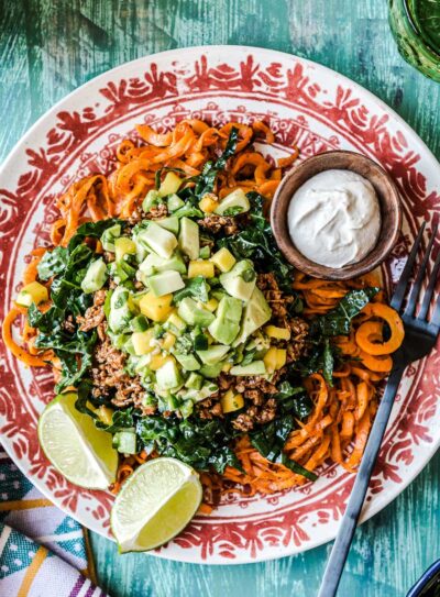 Vegetarian taco salad on a brightly decorated plate.