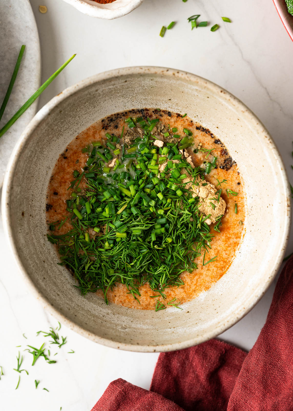Mixture of cashew milk, spices and fresh herbs.