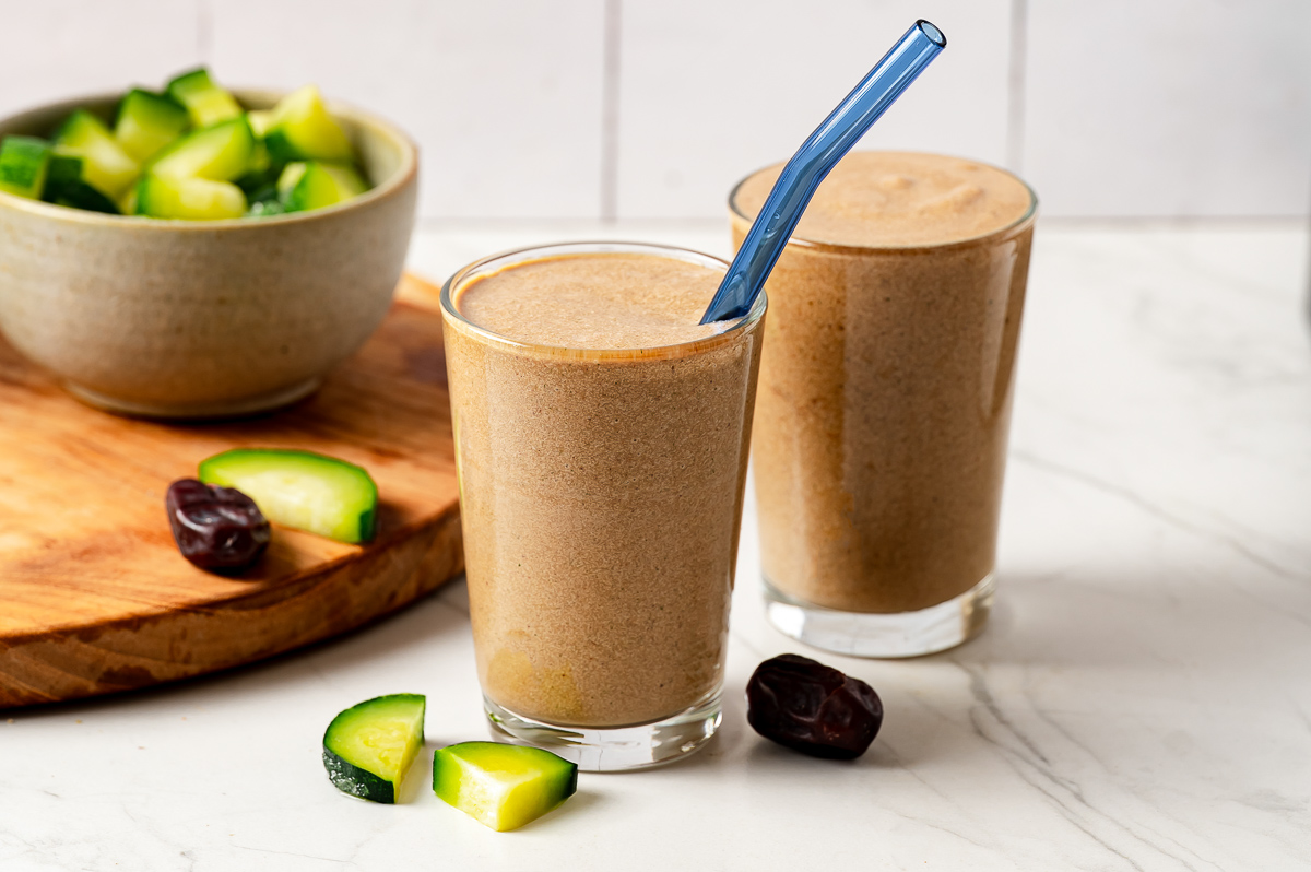 Ready to drink low calorie smoothie in glasses with blue straw