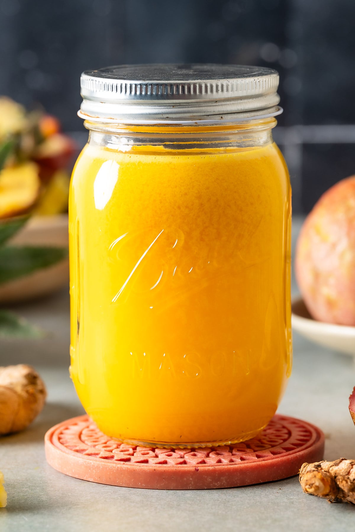 Mason jar filled with freshly made anti-inflammatory golden juice