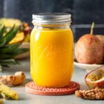 Mason jar filled with freshly made anti-inflammatory golden juice