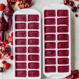 Antioxidant smoothie cubes, freshly frozen in white ice trays