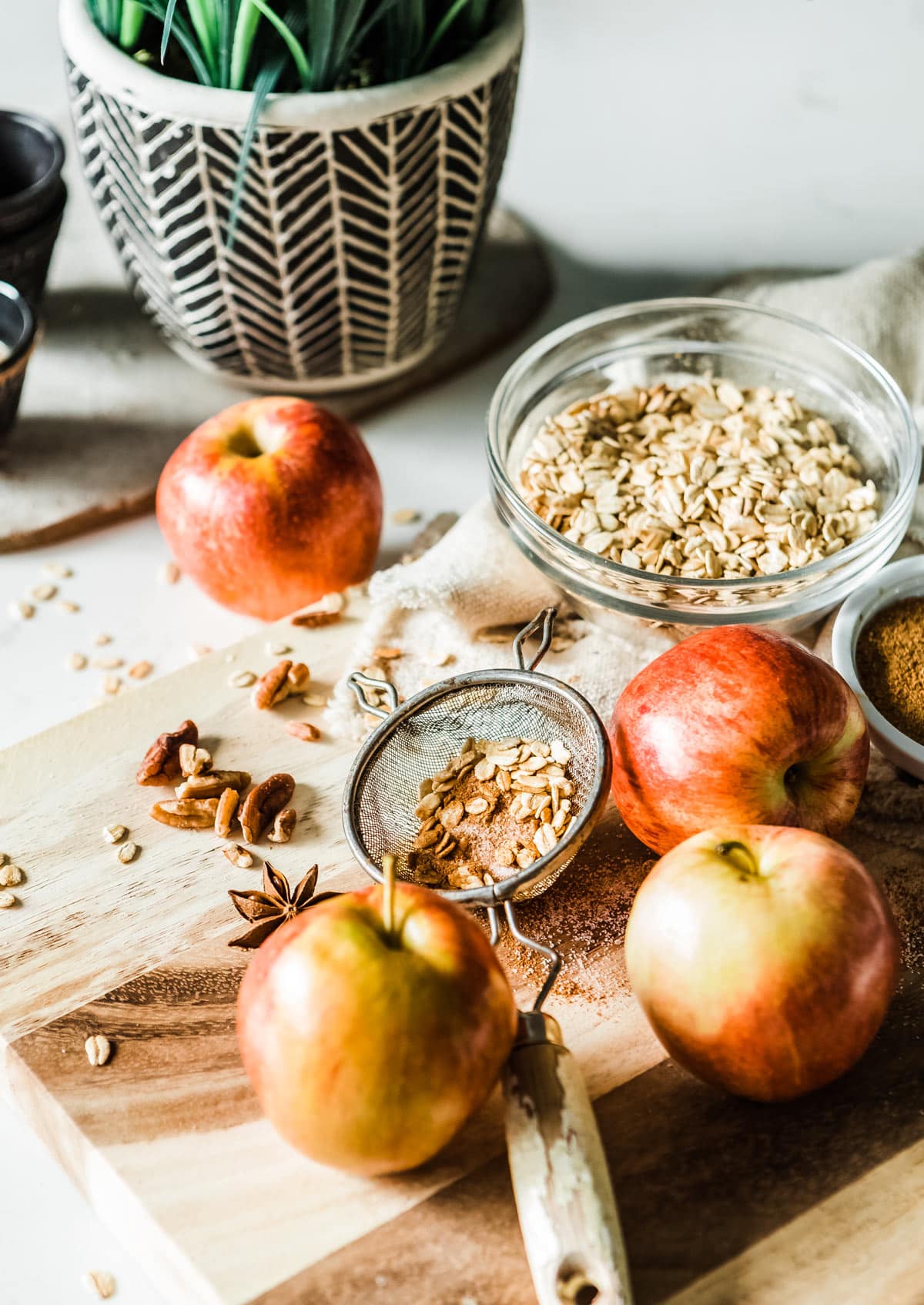Apples, oats, and spices for Cinnamon Apple Baked Oatmeal.