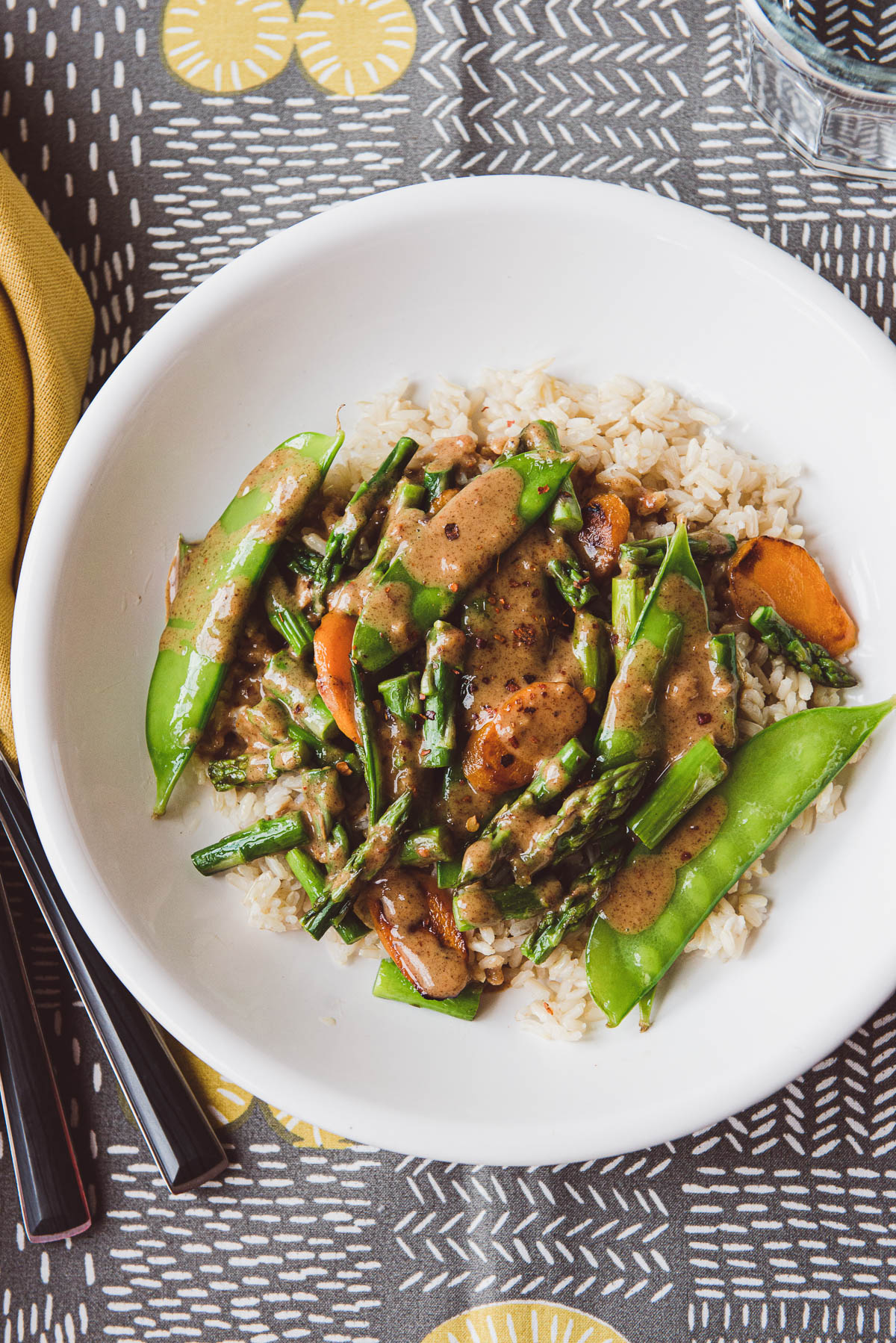 asparagus stir-fry on a bed of brown rice.